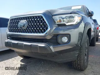 2018 Toyota Tacoma SR with VIN 5TFCZ5AN6JX127774, listed as a IAAI auction lot 41801158 with 28,161 mi miles and . Bid and sale history available at DreamBid. Image 17.