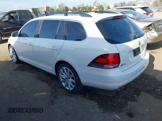 2013 Volkswagen Jetta SportWagen TDI w/Sunroof & Nav with VIN 3VWPL7AJ2DM632598, listed as a IAAI auction lot 42043462 with 99,922 mi miles. Bid and sale history available at carsss.com. Image 3.