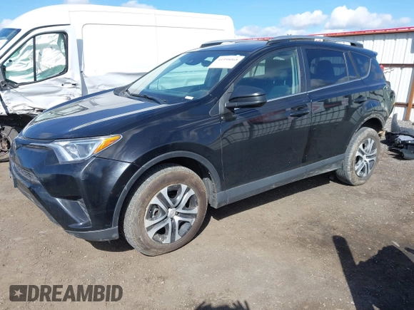 2018 Toyota RAV4 LE with VIN 2T3BFREV2JW749735, listed as a IAAI auction lot 41998068 with 112,468 mi miles. Bid and sale history available at carsss.com. Image 18.