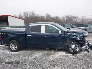 2022 Chevrolet Silverado 1500 LT with VIN 1GCUDDET0NZ597606, listed as a IAAI auction lot 40943441 with 32,673 mi miles and . Bid and sale history available at DreamBid. Image 13.