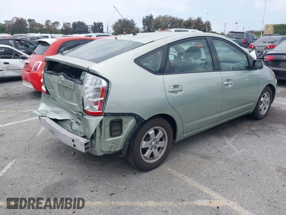 2007 Toyota Prius z VIN JTDKB20U477626959, wystawiony jako IAAI lot #42272184 z przebiegiem 179 443 mil mil oraz . Historia ofert i sprzedaży dostępna na DreamBid. Obrazek 4.
