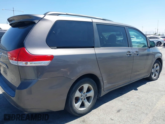 2011 Toyota Sienna LE AAS with VIN 5TDKK3DC4BS056872, listed as a IAAI auction lot 42643417 with 170,266 mi miles and . Bid and sale history available at DreamBid. Image 6.