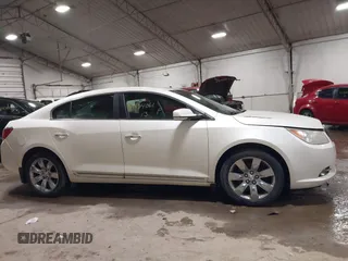 2013 Buick LaCrosse Leather z VIN 1G4GL5E31DF157332, wystawiony jako IAAI lot #41434061 z przebiegiem 153 426 mil mil oraz . Historia ofert i sprzedaży dostępna na DreamBid. Obrazek 13.