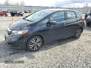 2018 Honda Fit EX-L with VIN 3HGGK5H99JM700706, listed as a Copart auction lot 50999845 with 74,985 mi miles and Salvage Title. Bid and sale history available at carsss.com. Image 1.