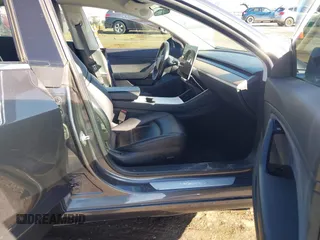 2018 Tesla Model 3 Long Range Battery with VIN 5YJ3E1EA4JF006036, listed as a IAAI auction lot 41934680 with 115,649 mi miles and . Bid and sale history available at DreamBid. Image 5.