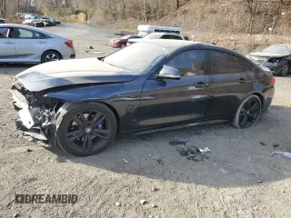 2015 BMW 4 Series 435i with VIN WBA4B1C5XFD955296, listed as a Copart auction lot 79456744 with 98,285 mi miles and Salvage Title. Bid and sale history available at DreamBid. Image 1.