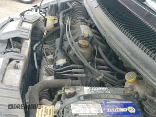 2004 Dodge Caravan SXT with VIN 2D4GP44L64R516111, listed as a IAAI auction lot 43330877 with 128,284 mi miles and . Bid and sale history available at DreamBid. Image 19.
