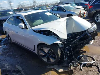 2024 BMW i4 xDrive40 with VIN WBY83FB0XRFS41891, listed as a IAAI auction lot 41630295 with 7,287 mi miles. Bid and sale history available at carsss.com. Image 1.