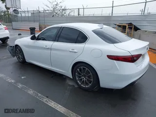 2019 Alfa Romeo Giulia with VIN ZARFAMANXK7600498, listed as a IAAI auction lot 41777643 with 100,492 mi miles. Bid and sale history available at carsss.com. Image 3.
