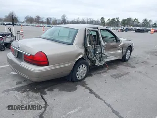2004 Mercury Grand Marquis LS Premium z VIN 2MEFM75W14X643516, wystawiony jako IAAI lot #42007171 z przebiegiem 213 531 mil mil oraz . Historia ofert i sprzedaży dostępna na DreamBid. Obrazek 4.