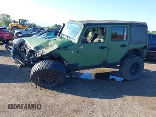 2008 Jeep Wrangler Unlimited X z VIN 1J4GA39198L612727, wystawiony jako IAAI lot #40128925 z przebiegiem 260 573 mil mil oraz . Historia ofert i sprzedaży dostępna na DreamBid. Obrazek 2.