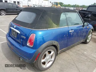 2006 MINI Convertible with VIN WMWRF33566TF65679, listed as a IAAI auction lot 42288864 with 119,884 mi miles and . Bid and sale history available at DreamBid. Image 4.