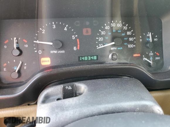 2000 Jeep Wrangler Sahara z VIN 1J4FA59S1YP746043, wystawiony jako Copart lot #58842665 z przebiegiem 148 348 mil mil oraz Szkoda całkowita • Salvage title. Historia ofert i sprzedaży dostępna na DreamBid. Obrazek 9.