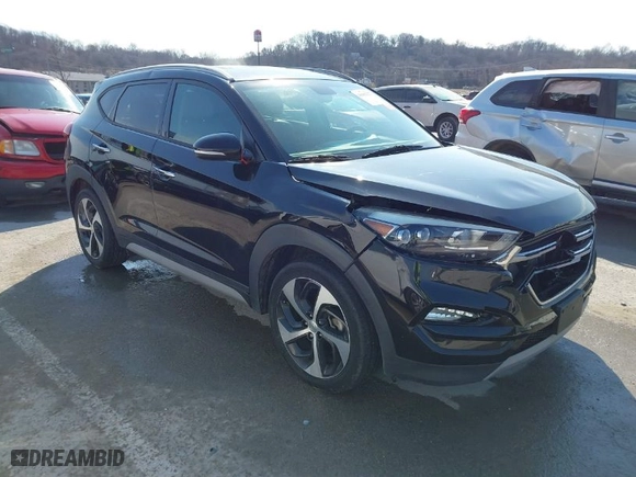 2017 Hyundai Tucson Value with VIN KM8J33A25HU586191, listed as a IAAI auction lot 41682127 with 58,877 mi miles. Bid and sale history available at carsss.com. Image 1.