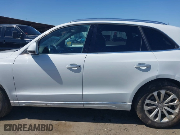 2015 Audi Q5 Premium Plus with VIN WA1LFAFP6FA096946, listed as a IAAI auction lot 41956824 with 97,328 mi miles and . Bid and sale history available at DreamBid. Image 15.