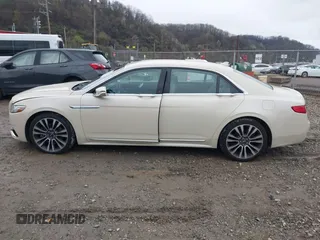2018 Lincoln Continental Reserve with VIN 1LN6L9NP1J5609285, listed as a IAAI auction lot 42011710 with 57,158 mi miles and . Bid and sale history available at DreamBid. Image 14.