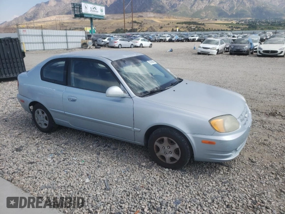 2005 Hyundai Accent GLS with VIN KMHCG35C55U341192, listed as a Copart auction lot 70708994 with 174,872 mi miles and Salvage Title. Bid and sale history available at carsss.com. Image 4.