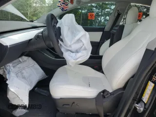 2021 Tesla Model Y Long Range z VIN 5YJYGDEE7MF081337, wystawiony jako Copart lot #55678295 z przebiegiem 58 809 mil mil oraz Szkody całkowita. Historia ofert i sprzedaży dostępna na DreamBid. Obrazek 7.