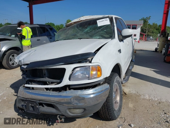 2003 Ford F-150 XLT with VIN 1FTRW08L63KA28964, listed as a IAAI auction lot 41689700 with 303,789 mi miles. Bid and sale history available at carsss.com. Image 18.