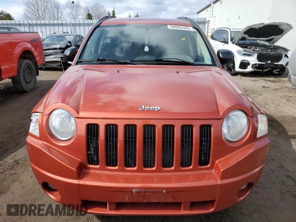 2010 Jeep Compass North Edition with VIN 1J4NF4FB0AD630982, listed as a Copart auction lot 50602465 with 233,513 mi miles and Clean Title. Bid and sale history available at carsss.com. Image 5.
