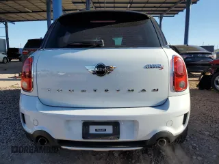 2015 MINI Countryman S with VIN WMWZC5C53FWP44388, listed as a Copart auction lot 54560585 with 67,913 mi miles and Salvage Title. Bid and sale history available at DreamBid. Image 6.