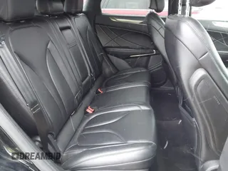 2017 Lincoln MKC Premiere with VIN 5LMCJ1D91HUL33023, listed as a IAAI auction lot 40976537 with 112,695 mi miles. Bid and sale history available at carsss.com. Image 8.