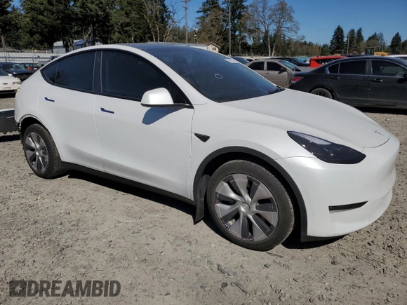 2023 Tesla Model Y Long Range z VIN 7SAYGDEE7PF788932, wystawiony jako Copart lot #52822515 z przebiegiem 33 007 mil mil oraz Szkoda całkowita • Salvage title. Historia ofert i sprzedaży dostępna na DreamBid. Obrazek 4.