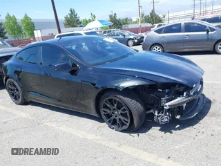 2022 Tesla Model S with VIN 5YJSA1E51NF464231, listed as a IAAI auction lot 42077838 with 53,290 mi miles and . Bid and sale history available at DreamBid. Image 1.