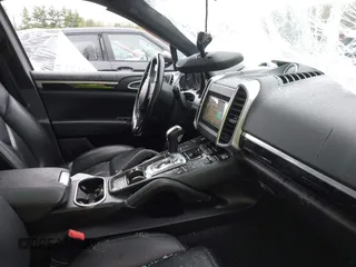 2014 Porsche Cayenne with VIN WP1AA2A24ELA97043, listed as a IAAI auction lot 42177993 with 147,162 mi miles and . Bid and sale history available at DreamBid. Image 5.