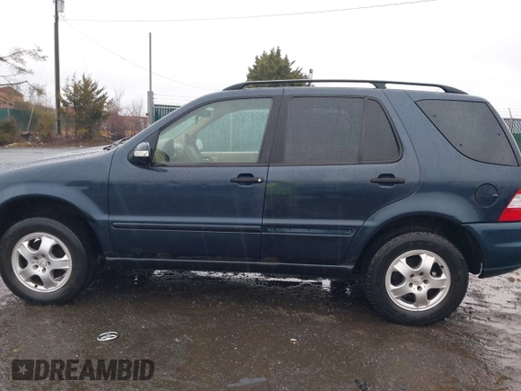 2003 Mercedes-Benz M-Class 3.2L with VIN 4JGAB54EX3A390987, listed as a IAAI auction lot 41482335 with 191,381 mi miles. Bid and sale history available at carsss.com. Image 14.
