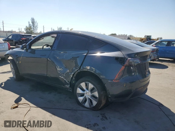 2024 Tesla Model Y Long Range с VIN 7SAYGDEE4RA243738, выставлен на аукционе Copart как лот 48953885 с пробегом Не указан миль и Списание • Salvage title. История ставок и продаж доступна на DreamBid. Изображение 2.