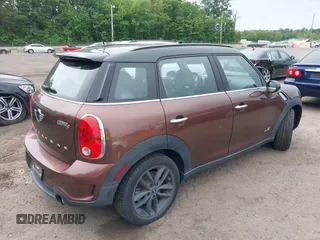 2014 MINI Countryman S z VIN WMWZC5C5XEWP38408, wystawiony jako IAAI lot #42360746 z przebiegiem 136 266 mil mil oraz . Historia ofert i sprzedaży dostępna na DreamBid. Obrazek 4.