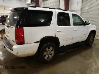 2009 GMC Yukon SLT w/4SB with VIN 1GKFK33099R252828, listed as a Copart auction lot 43205945 with 301,544 mi miles and Salvage Title. Bid and sale history available at carsss.com. Image 3.