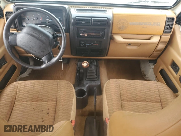 1998 Jeep Wrangler SE with VIN 1J4FY29P6WP796472, listed as a Copart auction lot 54879025 with 118,664 mi miles and Salvage title. Bid and sale history available at DreamBid. Image 8.