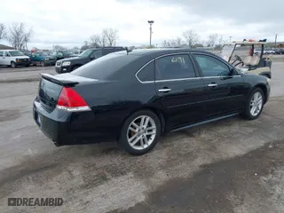 2013 Chevrolet Impala LTZ with VIN 2G1WC5E33D1129273, listed as a IAAI auction lot 42086191 with 206,340 mi miles. Bid and sale history available at carsss.com. Image 4.