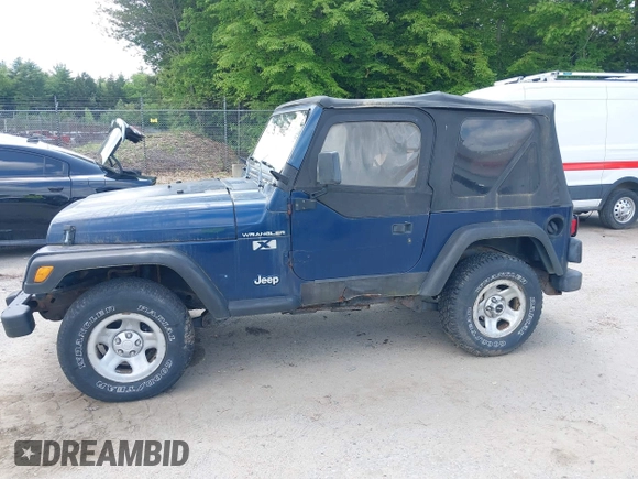 2002 Jeep Wrangler X with VIN 1J4FA39S82P735794, listed as a IAAI auction lot 42411386 with 141,219 mi miles and . Bid and sale history available at DreamBid. Image 12.