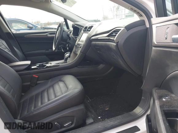 2016 Ford Fusion SE with VIN 3FA6P0T99GR268237, listed as a IAAI auction lot 41951459 with 117,309 mi miles. Bid and sale history available at carsss.com. Image 5.