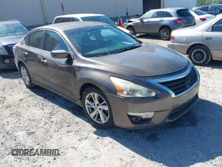 2015 Nissan Altima 2.5 S with VIN 1N4AL3AP3FC204149, listed as a IAAI auction lot 42005694 with 277,106 mi miles. Bid and sale history available at carsss.com. Image 1.