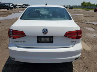 2015 Volkswagen Jetta SE with VIN 3VWD17AJ1FM295322, listed as a Copart auction lot 56074745 with 114,170 mi miles and Salvage title. Bid and sale history available at DreamBid. Image 6.