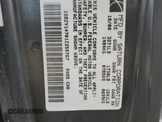 2001 Saturn SC z VIN 1G8ZY14701Z255767, wystawiony jako Copart lot #53727985 z przebiegiem 137 776 mil mil oraz Szkody całkowita. Historia ofert i sprzedaży dostępna na DreamBid. Obrazek 13.