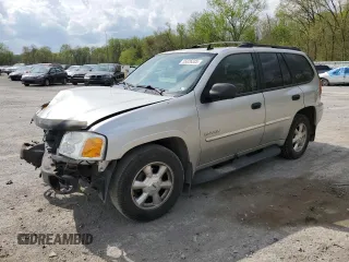 2006 GMC Envoy SLE z VIN 1GKDT13S662223768, wystawiony jako Copart lot #55026335 z przebiegiem 149 787 mil mil oraz Szkody całkowita. Historia ofert i sprzedaży dostępna na DreamBid. Obrazek 1.