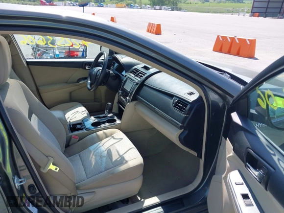 2012 Toyota Camry XLE z VIN 4T1BD1FK7CU037762, wystawiony jako IAAI lot #42253606 z przebiegiem 130 888 mil mil oraz . Historia ofert i sprzedaży dostępna na DreamBid. Obrazek 5.