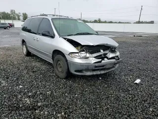 2000 Dodge Caravan SE with VIN 2B4GP44G3YR784939, listed as a Copart auction lot 73253264 with 198,883 mi miles and Salvage Title. Bid and sale history available at DreamBid. Image 12.