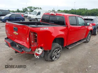 2020 Chevrolet Colorado 4WD Z71 with VIN 1GCGTDEN9L1105636, listed as a IAAI auction lot 42634615 with 106,469 mi miles and . Bid and sale history available at DreamBid. Image 4.