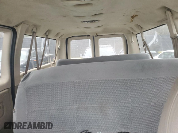 2006 Ford Econoline Passenger XL with VIN 1FBNE31L36HA02924, listed as a Copart auction lot 79903244 with 217,831 mi miles and Salvage title. Bid and sale history available at DreamBid. Image 10.