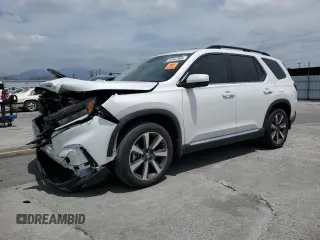 2023 Honda Pilot Elite z VIN 5FNYG1H83PB033682, wystawiony jako Copart lot #56567965 z przebiegiem 33 685 mil mil oraz Szkoda całkowita • Salvage title. Historia ofert i sprzedaży dostępna na DreamBid. Obrazek 1.