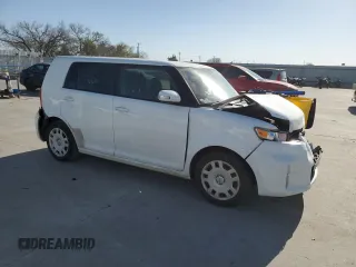 2015 Scion xB with VIN JTLZE4FE1FJ067927, listed as a Copart auction lot 49904265 with 132,456 mi miles and Salvage Title. Bid and sale history available at carsss.com. Image 4.