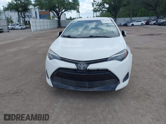 2019 Toyota Corolla L with VIN 5YFBURHE7KP908794, listed as a IAAI auction lot 38524964 with 65,069 mi miles. Bid and sale history available at carsss.com. Image 6.