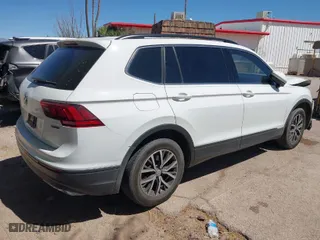 2019 Volkswagen Tiguan SE with VIN 3VV2B7AX1KM092616, listed as a IAAI auction lot 41868660 with 147,419 mi miles. Bid and sale history available at carsss.com. Image 4.
