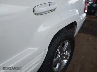 2004 Jeep Grand Cherokee Limited with VIN 1J8GW58N74C380204, listed as a IAAI auction lot 41756657 with 239,697 mi miles. Bid and sale history available at carsss.com. Image 6.